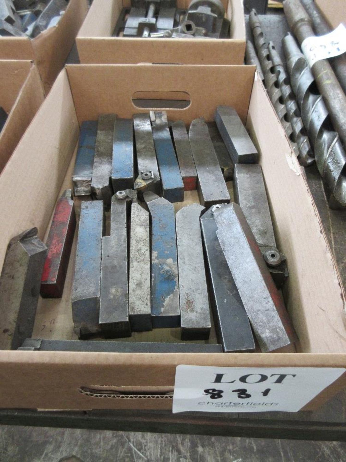 Box of various lathe cutting tools