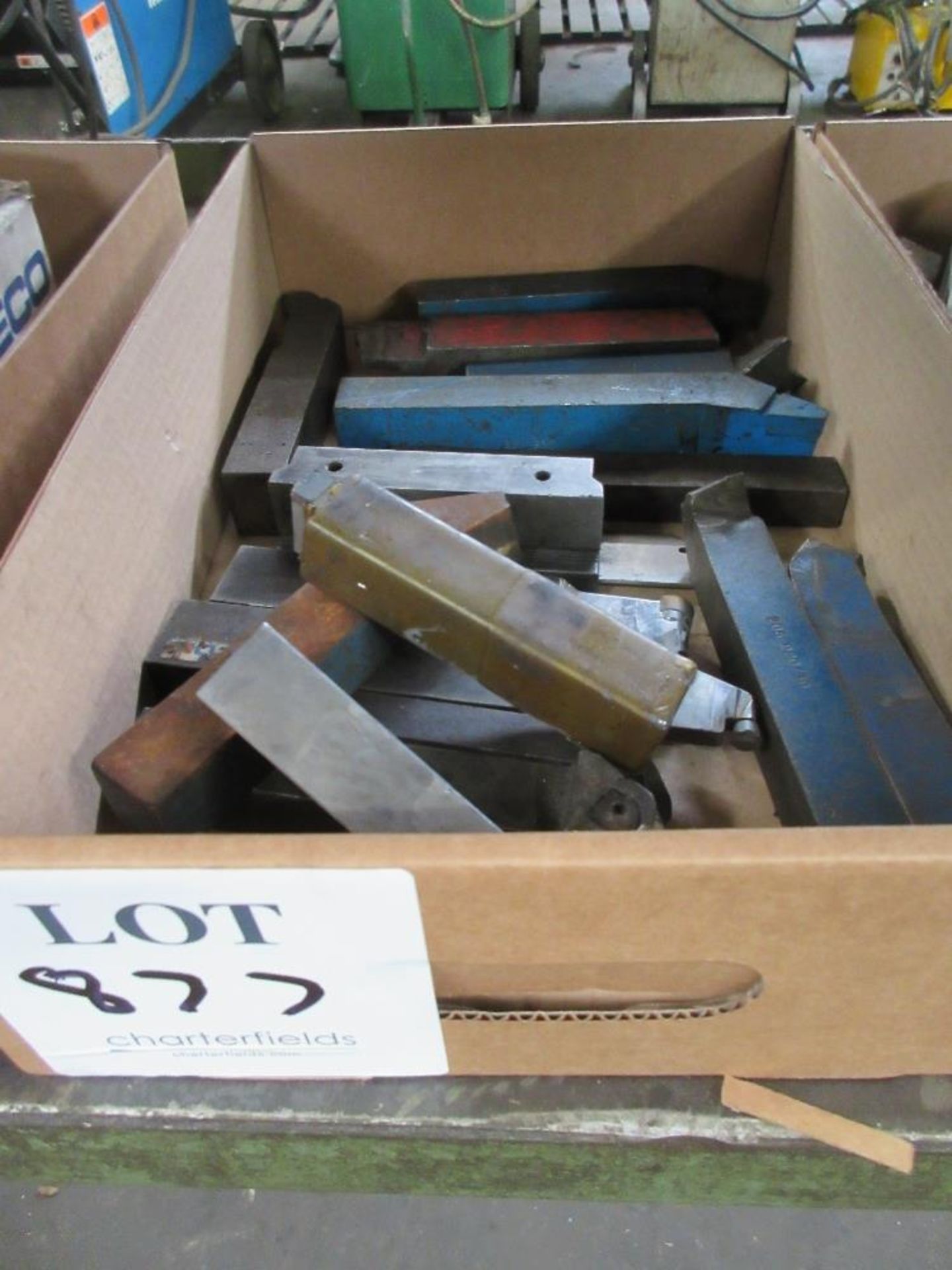 Box of various lathe cutting tools