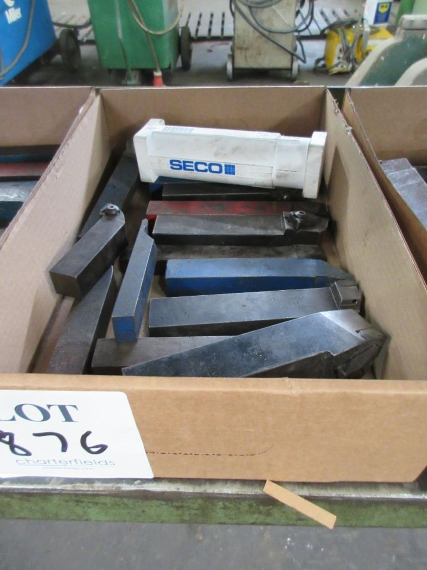 Box of various lathe cutting tools