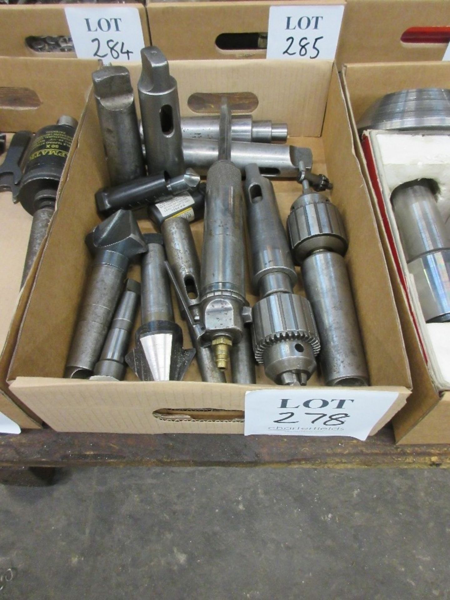 Various drill chucks, Morse taper sleeves and chamfering tools