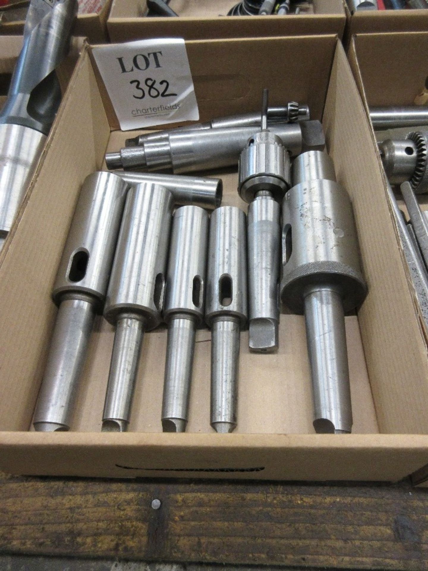 Various Morse taper drill extensions and drill chuck