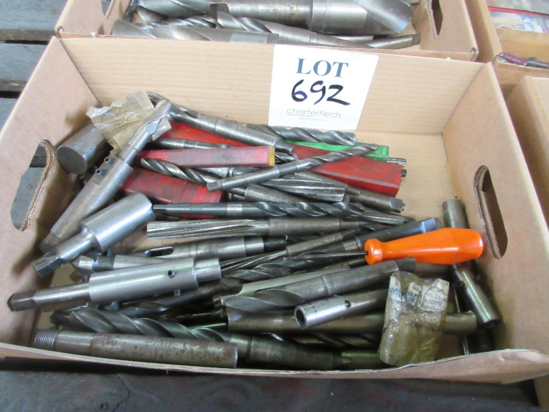 Box of various Morse taper twist drills and reamers