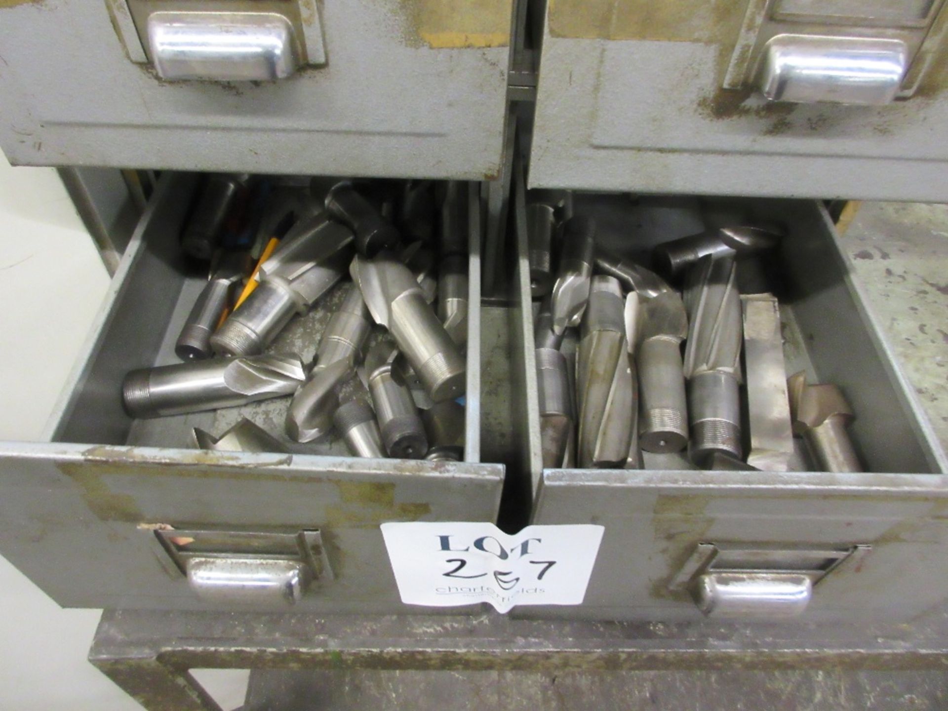 Set of drawers containing various slot drills and end mills