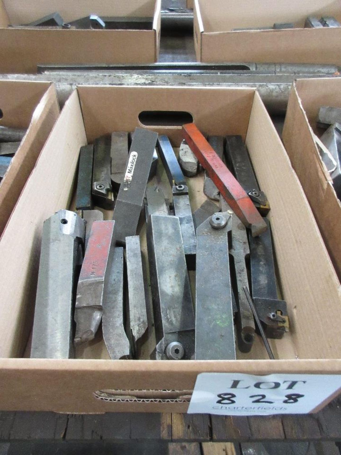 Box of various lathe cutting tools