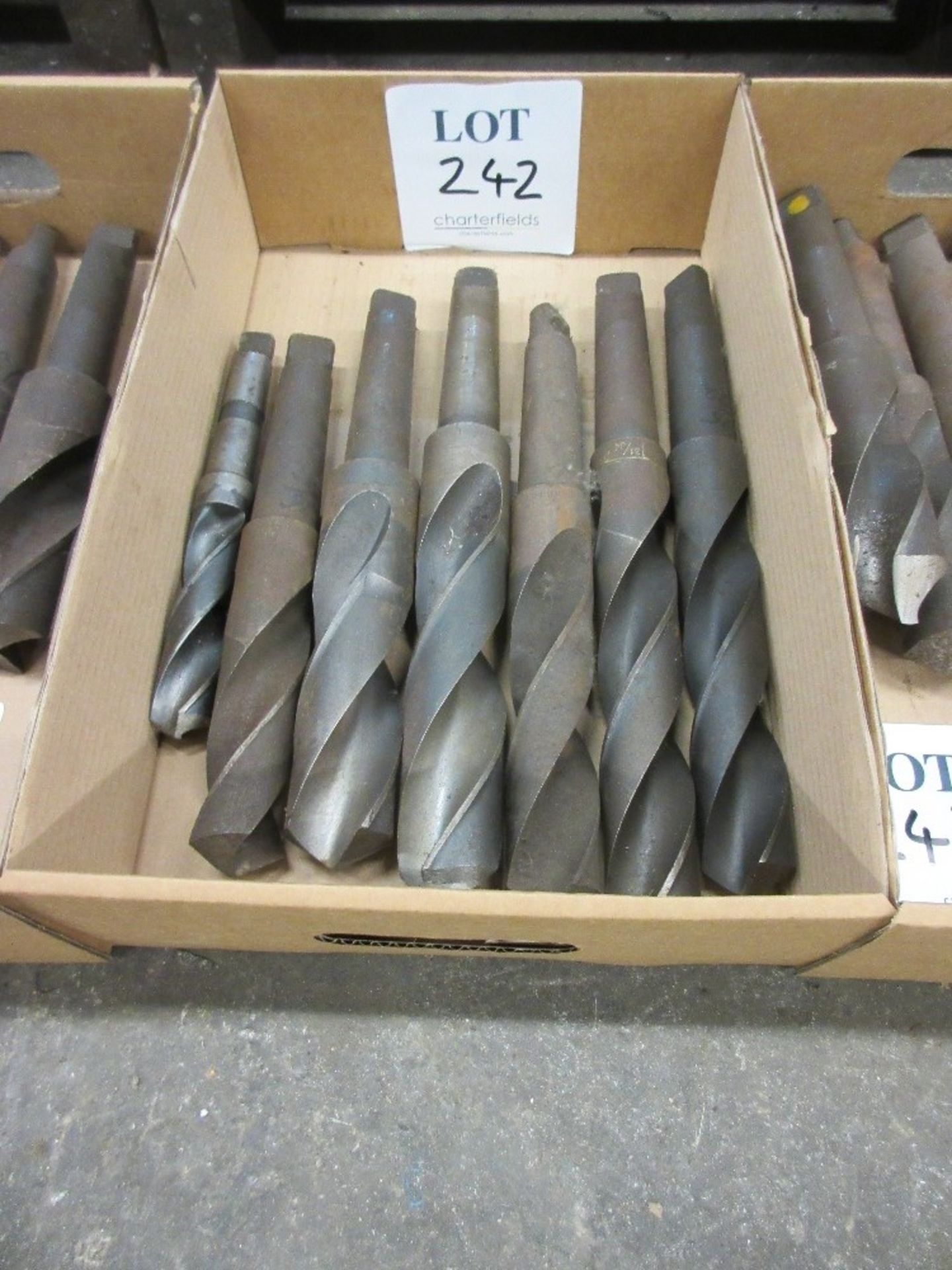 Box of various Morse taper twist drills