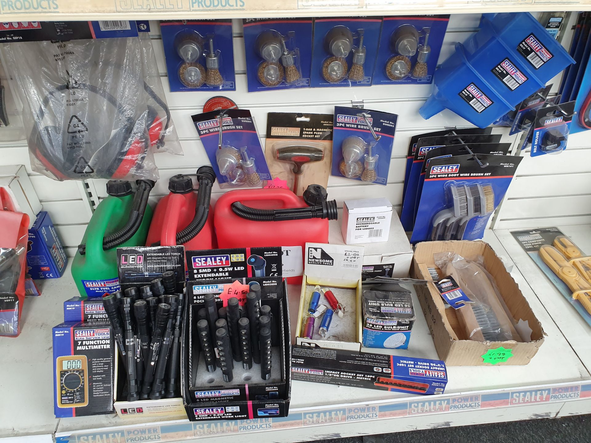 Quantity of Sealey wire brush sets, jerry cans and lighting equipment