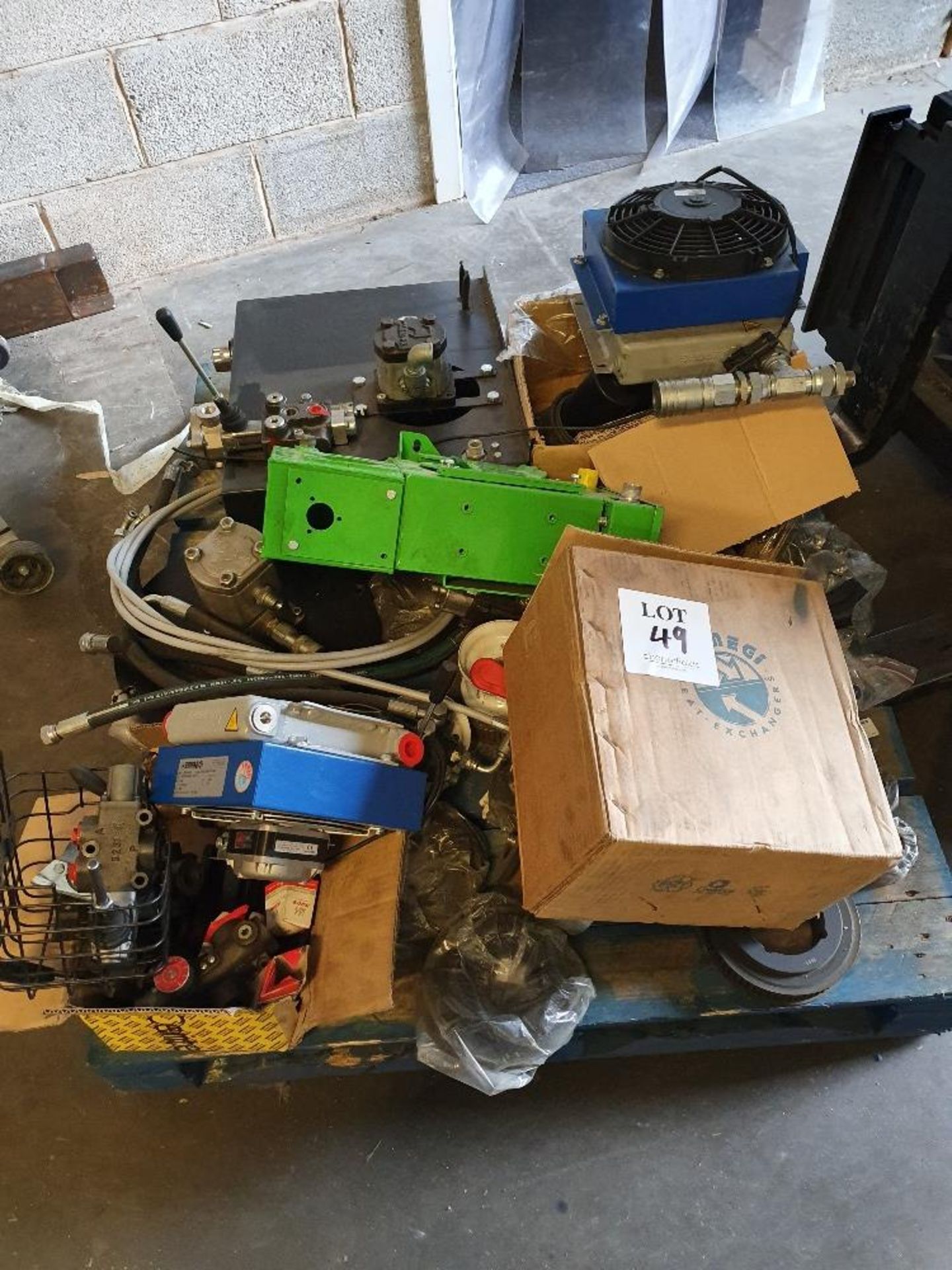 Pallet containing various oil coolers and pumps (£5.00 loading charge)