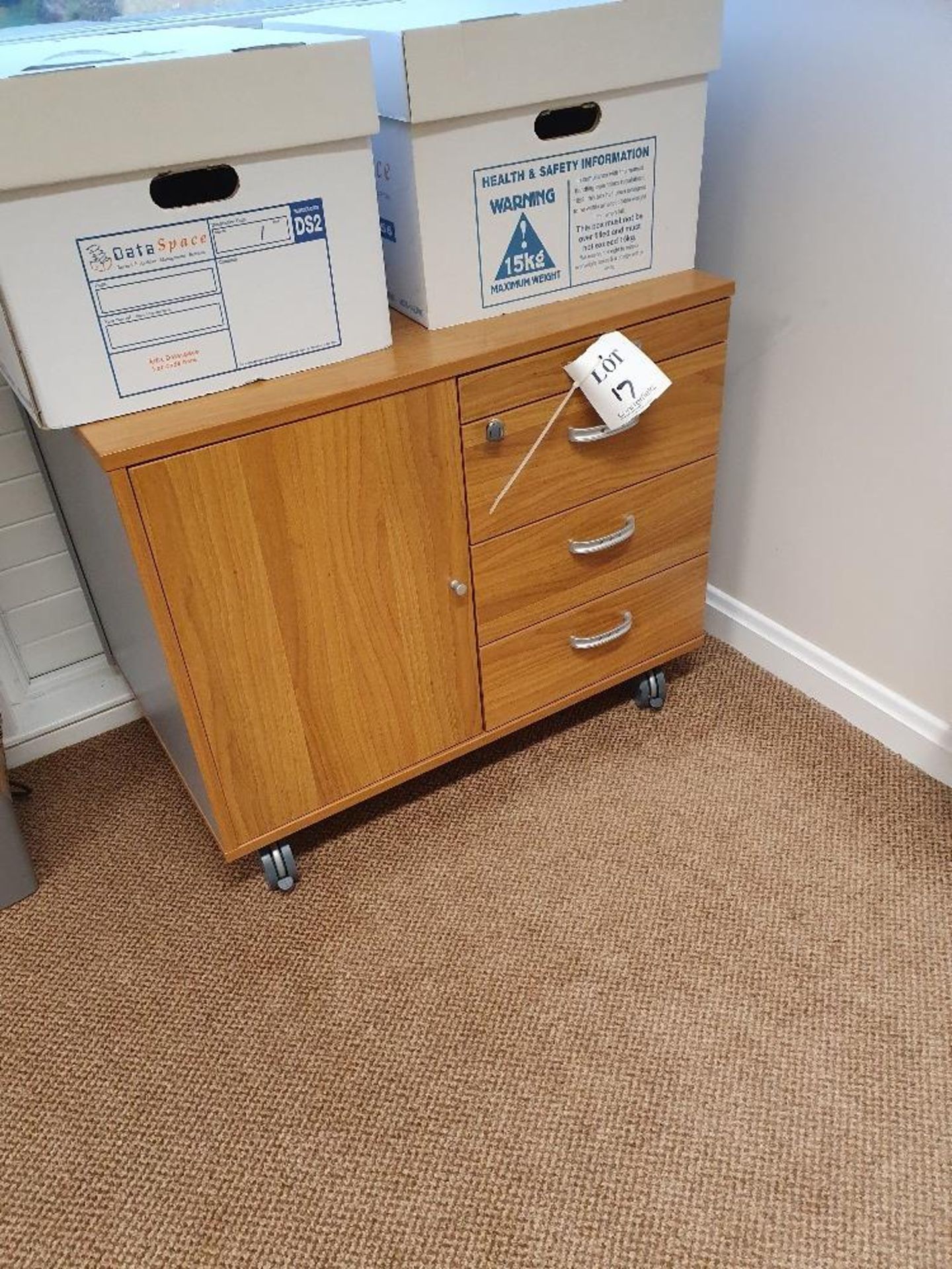 Wooden cabinet with four drawers