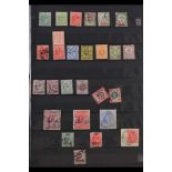 COLLECTIONS & ACCUMULATIONS COMMONWEALTH KEVII & KGV COLLECTION of mint & used stamps in a red
