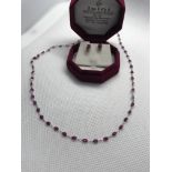 FINE RUBY NECKLACE & MATCHING EARRINGS SET IN WHITE METAL MARKED 750