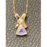 18ct GOLD TANZANITE & DIAMOND PENDANT WITH 18ct GOLD CHAIN