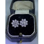 DIAMOND CLUSTER EARRINGS SET IN GOLD