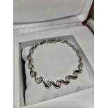 FINE WHITE GOLD DIAMOND SET BRACELET - MODERN DESIGN