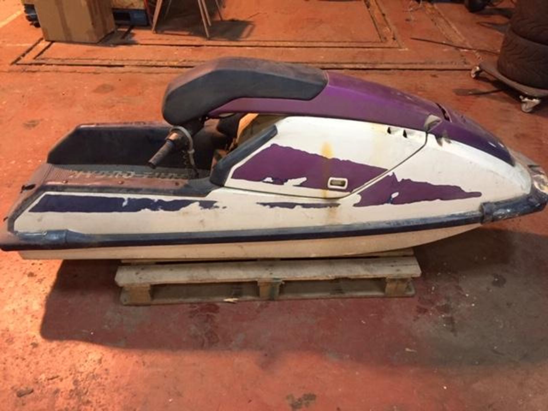 Kawasaki 650 twin Jet ski two stroke just got ready to be painted as in rub down