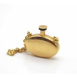 Kleines Duftfläschchen geprüft auf 750er Gold,Gewicht 8,9 g, Maße ohne Stutzten ca. 17,3 x 26,4 mm