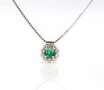 Necklace in 585 and pendant in 750 white gold with an emerald, approx. 1.5 ct and 10 brilliants,