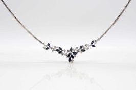750 white gold necklace with 14 blue sapphires, total approx. 3.11 ct and 23 brilliants, total