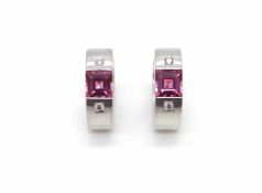 1 pair of earrings in 585 white gold with small diamonds, 0.06 ct and one pink tourmaline each.