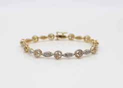 Bracelet in 585 gold and white gold with various brilliants, approx. 0.82 ct in medium quality.