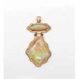 Pendant tested for 585 gold with 2 white precious opals.Weight 8,7 g, dimensions : 28,2 x 14 and