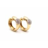 1 pair of 585 gold earrings with 38 brilliants, total ca. 0,30 ct.Weight 8.3 g, dimensions 21.9 x