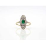 Ring tested on 585 gold with an emerald approx. 0.30 ct and 28 diamonds total approx. 0.43 ct in