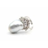 Ring tested for 585 white gold with a baroque South Sea cultured pearl 22 x 15 mm, 11 brilliants,
