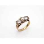 Ring tested for 585 gold with a cultured pearl and 2 diamonds, total approx. 0.50 ct in low