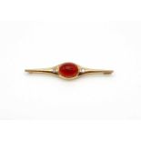 Brooch made of 750 gold with a fire opal and 2 brilliants, total ca. 0,18 ct.weight 10,9 g, length 7