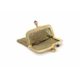 Wallet made of 585 gold with 2 sapphire cabochons each 0.45 ct.weight 21,4 g, dimensions : 4 x 4,5