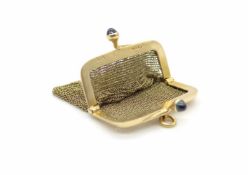 Wallet made of 585 gold with 2 sapphire cabochons each 0.45 ct.weight 21,4 g, dimensions : 4 x 4,5