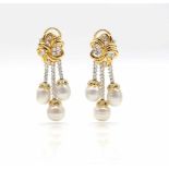 1 pair of earrings made of 750 gold with brilliants, total ca. 2,20 ct in medium quality and 6 South