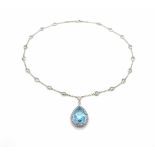 750 white gold necklace with topazes, total approx. 26 ct, main stone approx. 20 ct and various