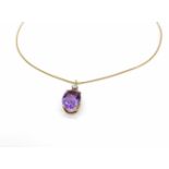 Necklace with pendant in 585 gold with an amethyst and a brilliant, approx. 0.22 ct in medium