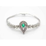 Bracelet in 750 white gold with an emerald, approx. 0.40 ct and approx. 106 brilliants total approx.