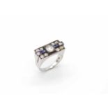 Ring made of 585 white gold with 4 sapphires and 11 diamonds, total approx. 1.5 ct, except for 1