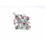 1 brooch in 750 white gold with diamonds, approx. 4.2 ct in high quality, rubies, approx. 2.25 ct,