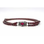 Chain with 2 rows of garnet balls and a lock tested for silver.weight 82,9 g, length approx. 40