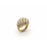 Ring tested for 750 gold with 74 diamonds, total approx. 0.70 ct in high to medium quality.Weight