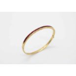 Bangle tested for 21,6 ct gold with 31 rubies, total ca. 4,6 ct. The bracelet would have to be re-