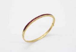 Bangle tested for 21,6 ct gold with 31 rubies, total ca. 4,6 ct. The bracelet would have to be re-