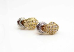 1 pair of earclips made of 750 gold with 50 diamonds, total approx. 1.4 ct in high purity and