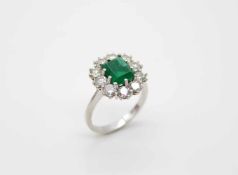 Ring made of 585 white gold with an emerald of approx. 2.1 ct and 10 diamonds, total approx. 1.9 ct,