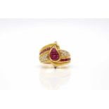 Ring tested to 21.6 ct gold with 2 sapphires, rubies total approx. 0.80 ct and diamonds, total