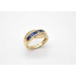 Ring made of 585 gold with 7 sapphires in staircase square cut, total approx. 0.90 ct and 10