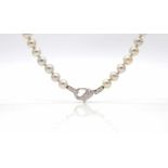 Akoya cultured pearl necklace, diameter 7.0 to 7.4 mm, lock tested on 585 gold with 30 diamonds,