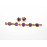 Jewellery set consisting of a bracelet, a ring and a pendant made of 585 gold with 7 amethysts.