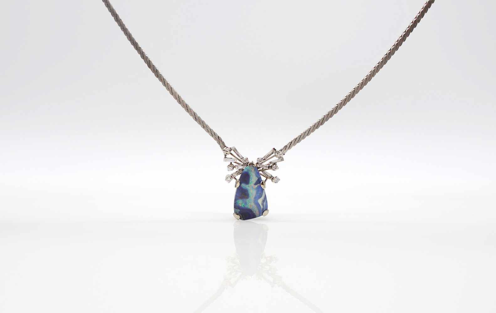 750 white gold necklace with a boulder opal, 21 x 13.5 mm and 16 diamonds, total ca. 0.50 ct. - Image 3 of 4