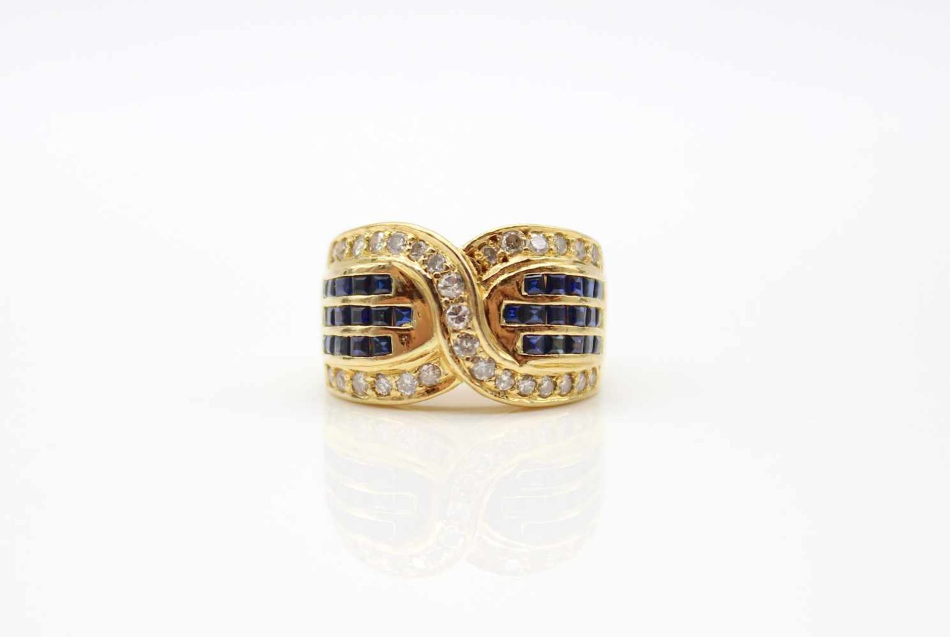 Ring made of 750 gold with 32 sapphires, total approx. 0.65 ct and 29 diamonds, total approx. 0.50