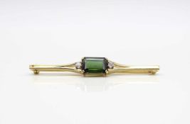 Needle made of 585 gold with a tourmaline approx. 4 ct and 2 diamonds each 0.07 ct,Weight 7.2 g,